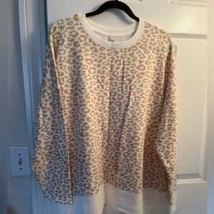Cream colored, leopard print sweatshirt
